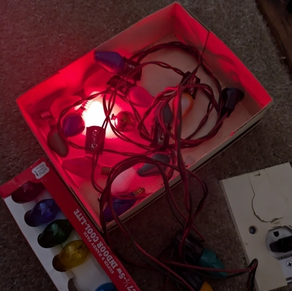Vintage Christmas lights  Multicolor and extra bulbs.